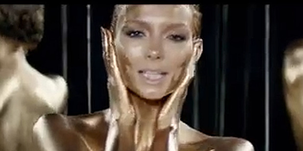 Ricki-Lee gets raunchy in her new video for Come & Get In Trouble With Me. Photo / YouTube