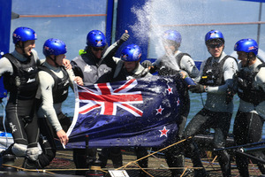 Peter Burling and his crew celebrate after winning the Red Bull Youth America's Cup. Photo / Gilles Martin-Raget