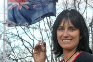 Tina Grant, New Zealand Army liaison officer for families of the fallen, holds a memorial cross brooch acknowledging the death of her husband, Corporal Doug Grant, in Afghanistan. Photo / Craig Baxter