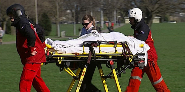 Victims of a crash at Arthurs Pass are taken to a waiting helicopter. Photo / 3 News