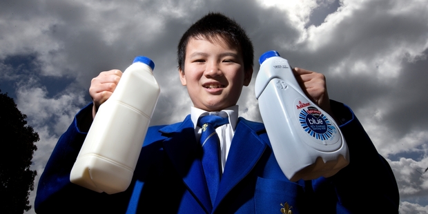 Tristan Pang, 11, says he found milk degraded faster in the triple-layer bottle than the single. Photo / Brett Phibbs
