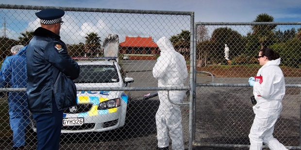 Police look for clues at the Quan Am Buddhist Monastery where Master Thich Phuoc An was attacked last month. Photo / APN