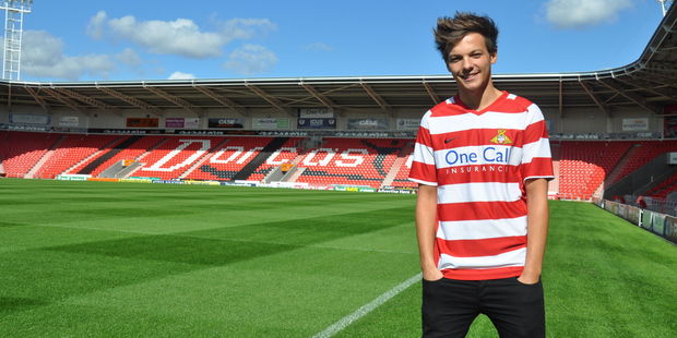 Louis Tomlinson had a rough ride during a charity football match. Photo / AP