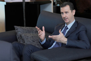 Syrian President Bashar Assad says he'll destroy his chemical weapons - but only if threats of military action from the US cease. Photo / AP