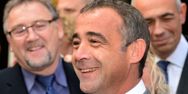 British actor Michael Turner, who uses the stage name Michael Le Vell, smiles as he speaks to the media outside Manchester Crown Court. Photo / AFP