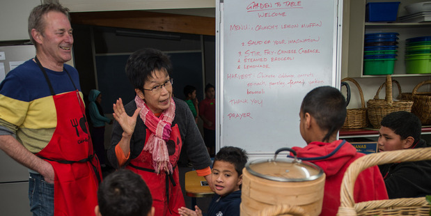 Grant Allen is introduced to pupils at East Tamaki School, where pupils have their own garden, where they grow their own vegetables. Photo / Jason Burgess