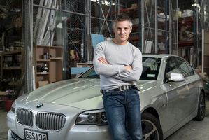 Shane Cortese with his BMW 5 Series Hybrid. Picture / Ted Baghurst