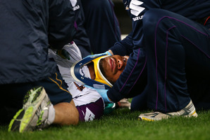 Storm winger Sisa Waqa receives medical attention. Photo / Getty Images