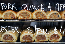 Pies and sausage rolls on sale from Urban Bounty. Photo / Christine Cornege
