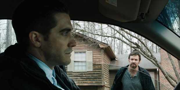Jake Gyllenhaal, left, and Hugh Jackman in a scene from Prisoners.