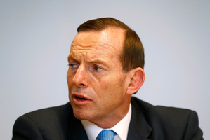 Abbott said the new micro-parties, as well as Labor and the Greens, should abide by the mandate Australian voters gave the new Government. Photo / AP