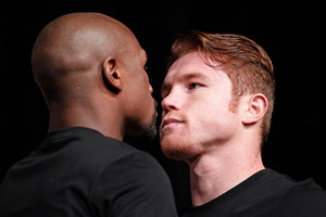 Floyd Mayweather Jr (left) and Saul Alvarez face off ahead of the big fight. Photo / AP