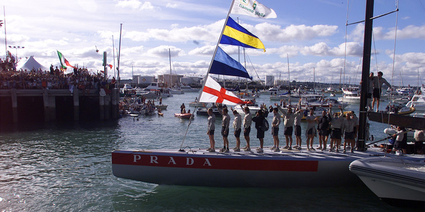 Prada yacht Luna Rossa is welcomed back to the America's Cup Village by supporters after winning the 2000 Louis Vuitton Cup. Planning is already underway for possible new sites for an America's Cup defence. Photo / NZ Herald