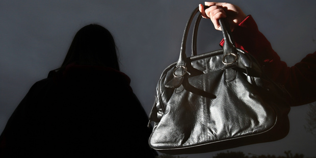 A man and a woman have been accused of allegedly snatching a couple's bags.
