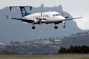The Eagle has landed (this time) - An Air New Zealand Eagle Air flight touches down at Onerahi airport NAO 04Jul13 - AIR BRAKES: Passengers expecting to fly into Whangarei on Eagle Air's Beech 19