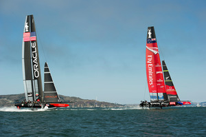 Emirates Team New Zealand leads Oracle Team USA down the first run in race seven on day four of the America's Cup 34. 12/9/2013. Photo / File.
