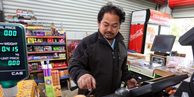 Chheun Sean back at work in the Vegie Twins after being held up at gunpoint. Photo / John Stone