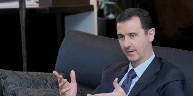 President Bashar al-Assad giving an interview with Russian newspaper Izvestia in Damascus. Photo / AFP