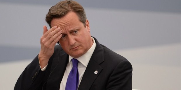 British Prime Minister David Cameron reportedly left his red box with his ministerial files unattended on a train, although his office says his security detail was right there. Photo / AFP