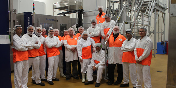 Frucor staff in front of the new equipment installed at the Manukau plant.
