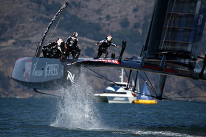 Emirates Team New Zealand, skippered by Dean Barker, in action against Oracle Team USA. Photo / Getty Images