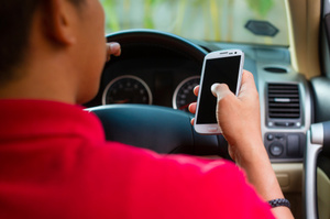 The driver played an evenly matched game of "lookie roadie, lookie phonie". Photo / Thinkstock