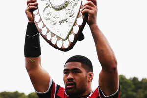 Still ours ... Fritz Lee of Counties Manukau shows the Ranfurly Shield after yesterday's game. Photo / Getty Images