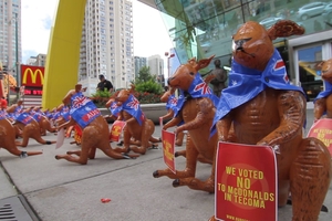 Inflatable kangaroos add to the protest outside the McDonald's headquarters in Chicago.