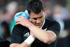 Daniel Carter of New Zealand walks off injured during the Rugby Championship Test rugby union match between the New Zealand All Blacks and South Africa. Photo / Getty Images.