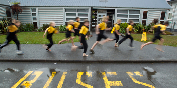 Local infrastructure needs, such as new footpaths for a walking bus for Dairy Flat School students, are big election issues in Rodney. Photo / Richard Robinson