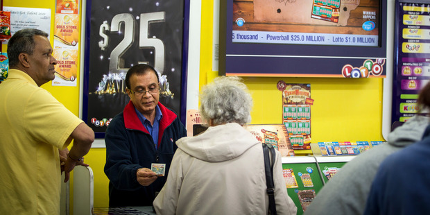 Gotta be in ... Lotto buyers were queuing yesterday to buy tickets from Harry Wadan in Blockhouse Bay. Photo / Michael Craig