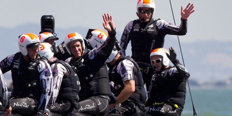 Emirates Team New Zealand skipper Dean Barker, and his team wave to supporters. Photo / Brett Phibbs