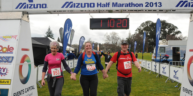 Graeme Joyes (right) was buoyed by the support he received at the Taupo Half Marathon. Photo / Super Sport Images