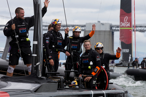 Oracle team USA wave to supporters after beating Emirates Team New Zealand to win Race 13 of the America's Cup, on San Francisco Bay, San Francisco. Photo / Brett Phibbs.