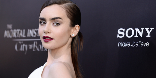Actress Lily Collins is one of the most dangerous celebs to Google. Photo / AP