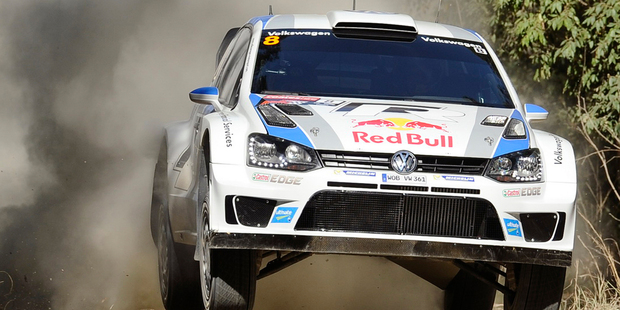 Sebastien Ogier of France and his co-driver Julien Ingrassi race their car during the Rally Australia at Coffs Harbour. Photo / AP