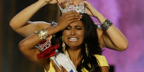 Miss New York Nina Davuluri is crowned as Miss America 2014 by Miss America 2013 Mallory Hagan.Photo / Mel Evans