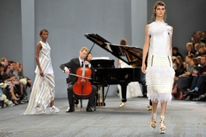 Models wear designs from Erdem at London Fashion Week. Photo by Richard Chambury/Invision/AP Images