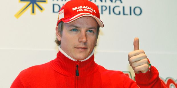 In this Jan. 15, 2009 file photo, then Ferrari Finnish driver Kimi Raikkonen gives the thumbs-up during a news conference. Raikkonen has signed a two year contract with Ferrari starting next year