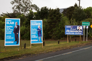 Candidates' billboard photos make them look shifty and desperate. Photo / Greg Bowker