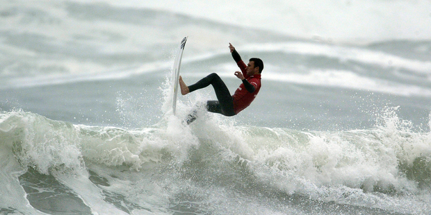 Billabong team rider Joel Parkinson launching at Piha in 2006. Photo / Dean Purcell