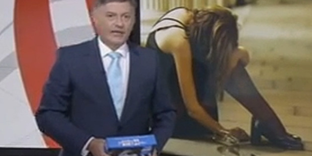 BBC news presenter Simon McCoy with his "iPad". Photo / YouTube