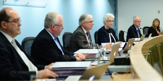 Justice Peter McClellan (3rd-L) gives his opening remarks at the beginning of the public hearings at the Royal Commission into Institutional Responses to Child Sexual Abuse in Sydney. Photo / AFP