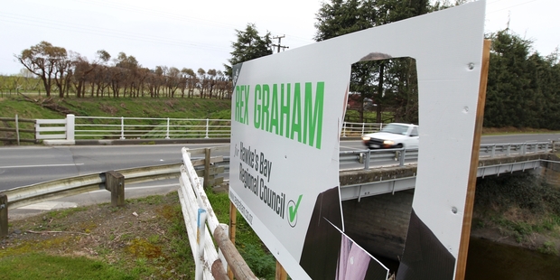 A sign for HBRC candidate Rex Graham has been targeted. Photo / Duncan Brown