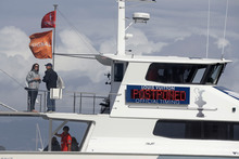 A readerboard on the race committee boat announces that the 14th race of the America's Cup sailing event has been postponed.Photo / AP