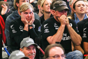 New Zealand fans watch race 13 of the America's Cup between Emirates Team New Zealand and Oracle Team USA at Shed 10. Photo / Getty Images.