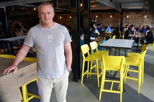 Owner Andrew Clapham at his new restaurant Tom Tom Bar and Eatery in Victoria Park Market.