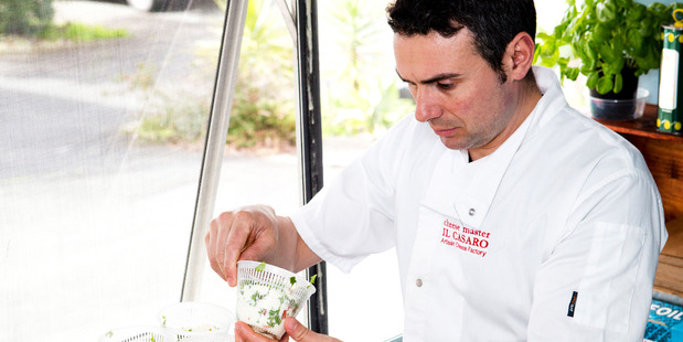 Italian cheese maker Massimiliano De Caro from Il Casaro surveys his fresh cheese in his small shop, which operates out of his industrial kitchen in Glenfield. Photo / Babiche Martens