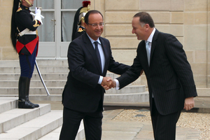 Francois Hollande greets John Key at the Elysee Palace yesterday during Mr Key's trip to Europe. Photo / Claire Trevett