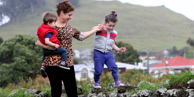 Louise Sly enjoys playing with her kids at Mangere Bridge, which was a backwater 10 years ago, but has rocketed in popularity. Photo / Jason Oxenham